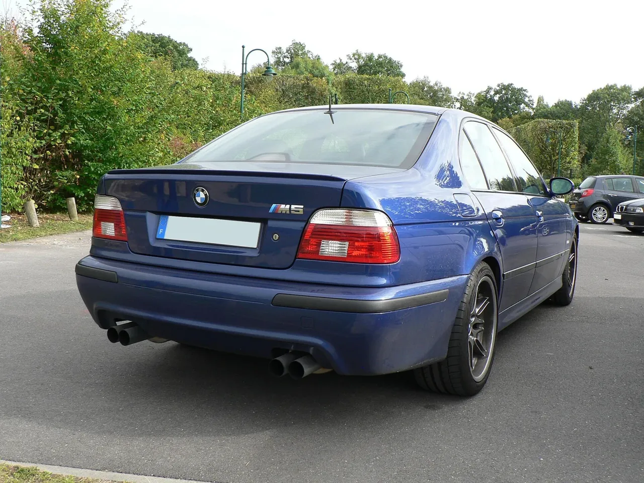 BMW M5 · Rear three-quarter