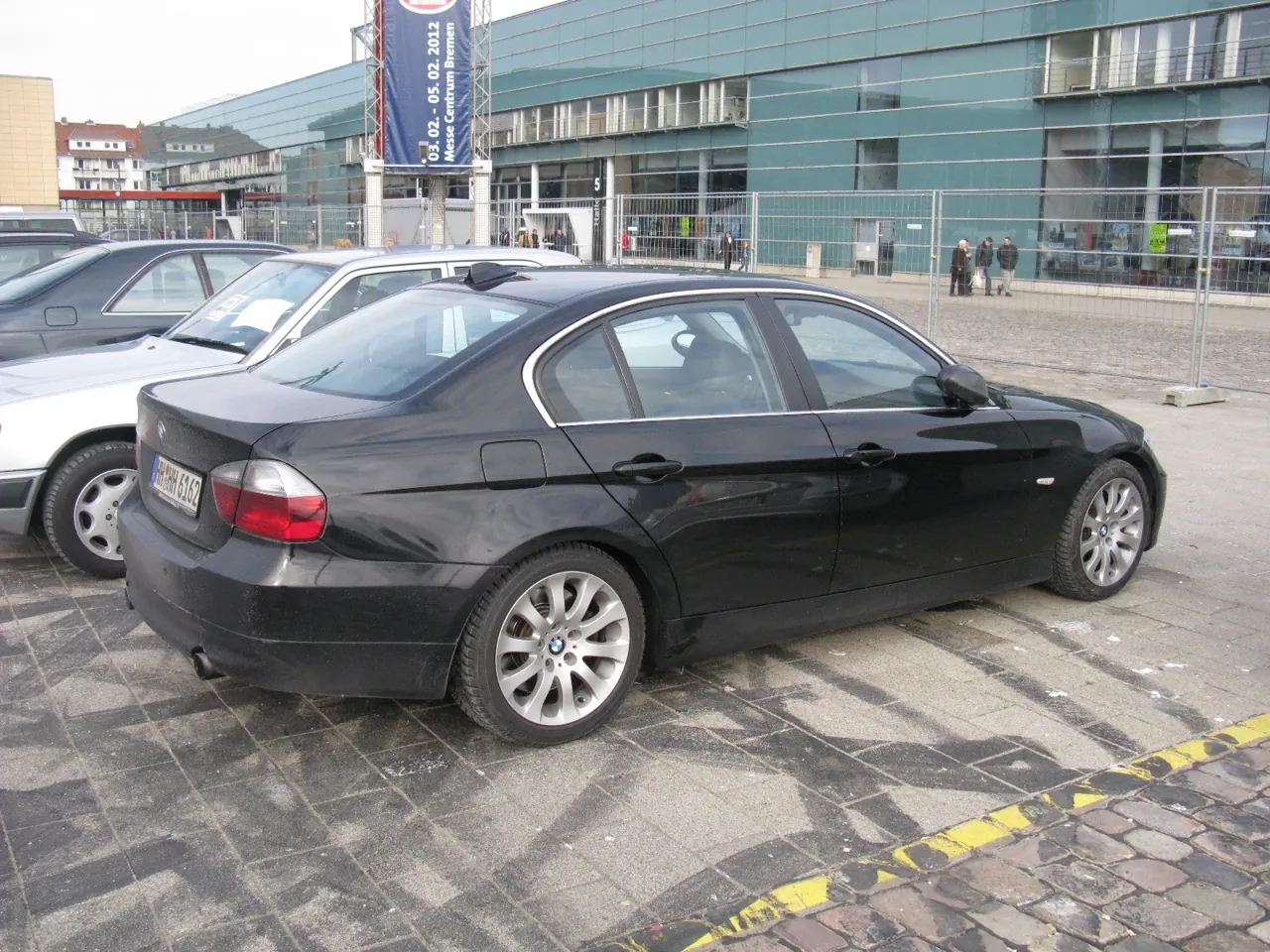 BMW 335i · Side / rear three-quarter