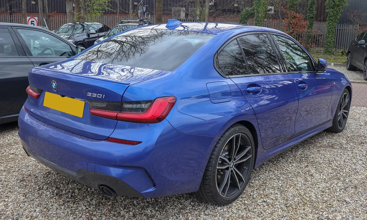 BMW 330i · Rear three-quarter