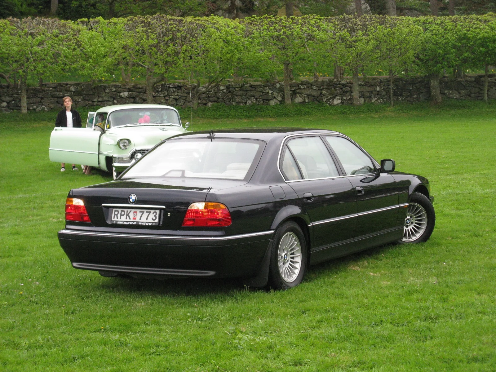 BMW 750iL · Rear three-quarter